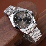 Rolex  Watch – silver with black Dial
